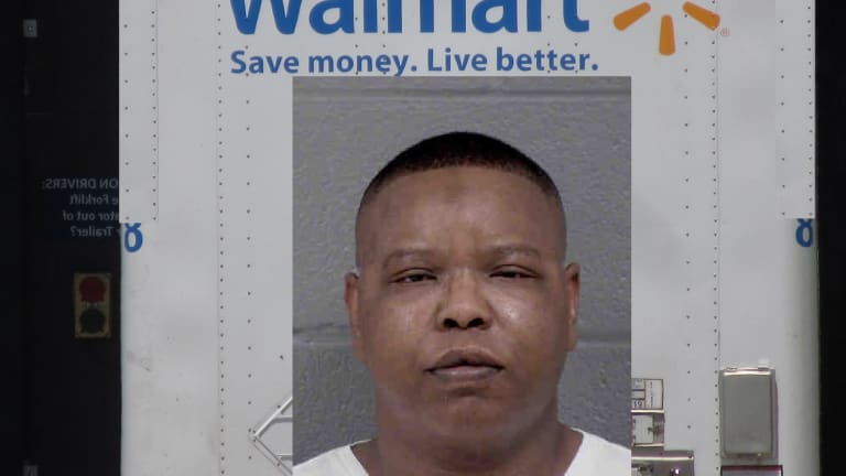 MAN STEALS $850,000 FROM WALMART