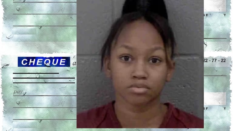 WOMAN ACCUSED OF ATTEMPTING TO CASH FRAUDULENT CHECKS