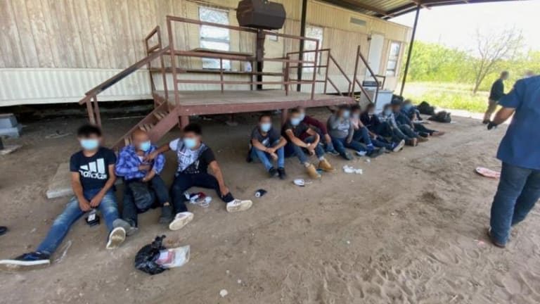 13 ILLEGAL IMMIGRANTS FOUND INSIDE STASH HOUSE 
