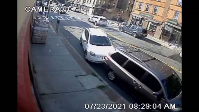 VIDEO: BABY HIT BY CAR WHILE IN MOTHER'S ARMS