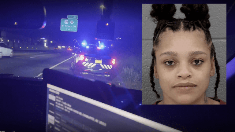 WOMAN JUMPS OUT OF MOVING POLICE CAR DURING ARREST ON I-485