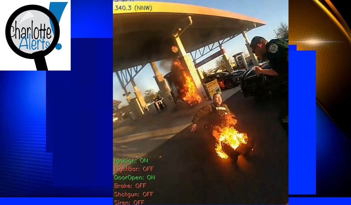 See video of a cop getting his legs burnt up at a gas station
