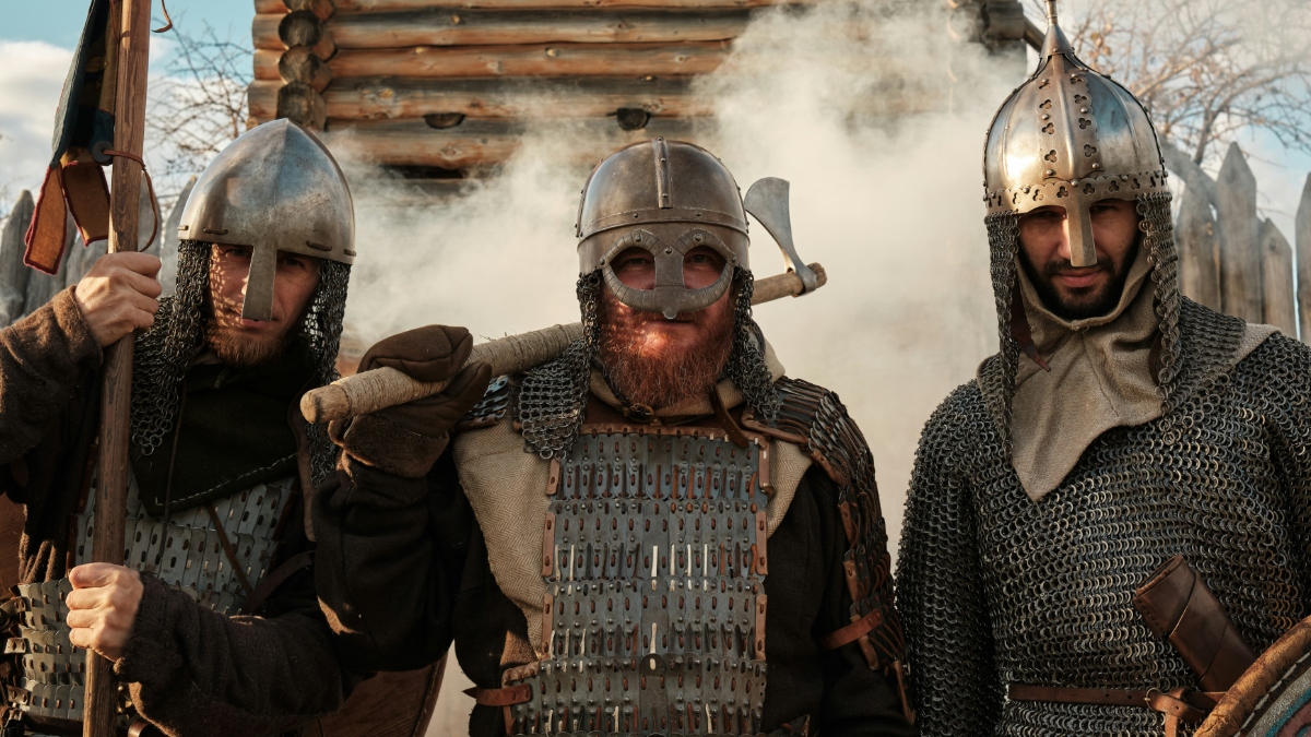 Why were the Vikings fighting mainly with axes, rather than with swords?