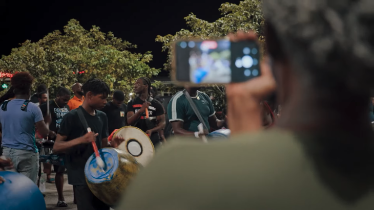 Moving vertigo: the director films his aunt who films his grandson walking in the footsteps of his uncle, the murdered drum player. | Alchemist films screenshot via YouTube