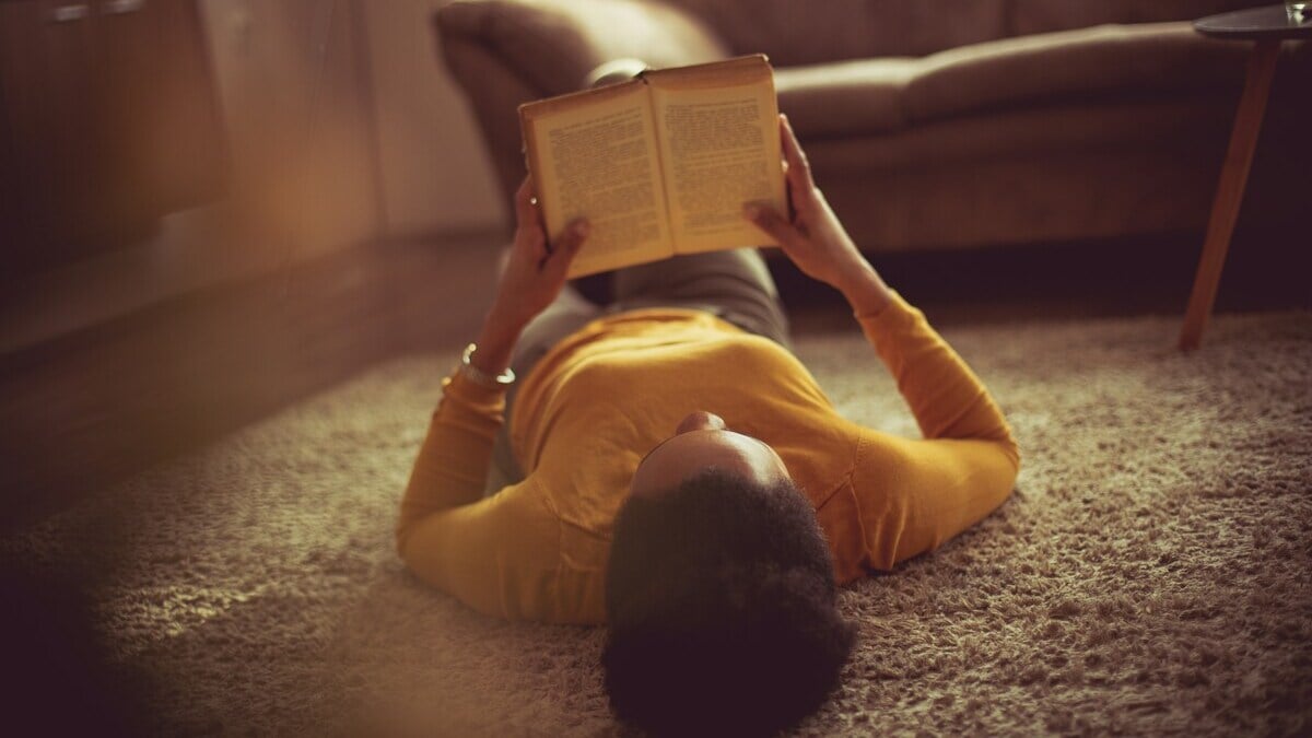 Why is there no perfectly comfortable position for reading books?